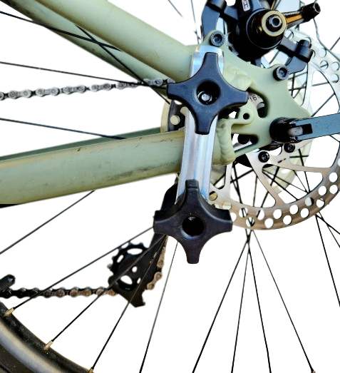 Extra Clamp, Knobs and Plate on a green Bike