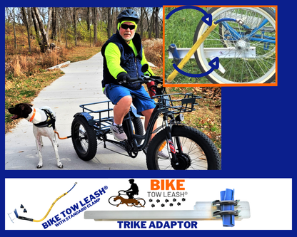 Person riding a trike with a dog on a path, featuring Bike Tow Leash products.
