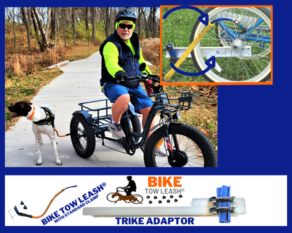 Person riding a trike with a dog on a path, featuring Bike Tow Leash products.